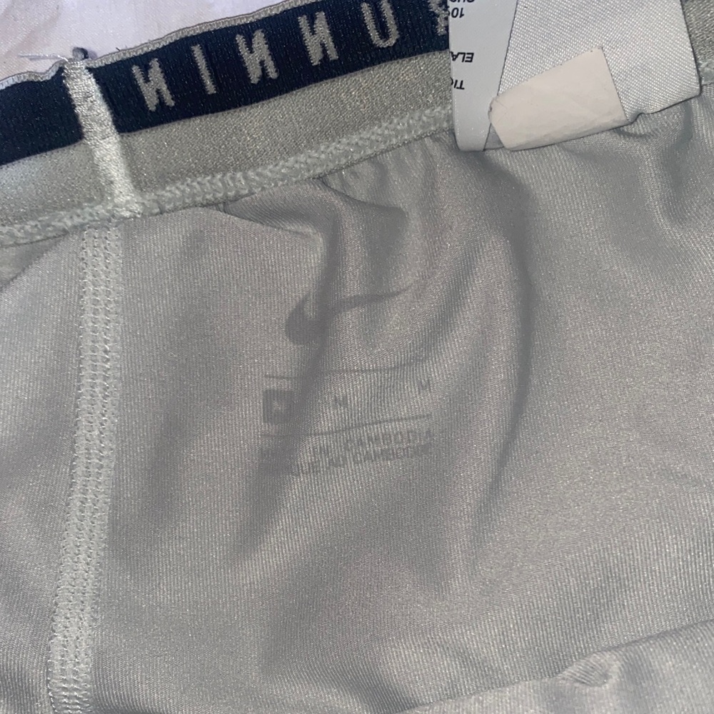 Nike Women's Light Gray Shorts with black Swoosh - Picture 2 of 11